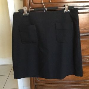 Woman’s short black skirt